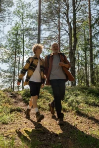 Grandparent and grandkid hiking after overcoming their anxiety