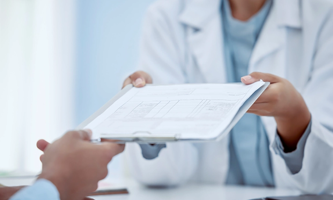 core-doctor-crop Doctor delivering genetic test results to patient